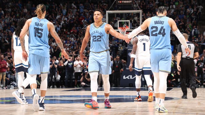 Memphis Grizzlies' Desmond Bane high-fives Dillon Brooks in their first-round playoff game against the Minnesota Timberwolves last season.