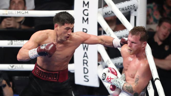 Boxer Dmitry Bivol punches Canelo Álvarez during their fight at the T-Mobile Arena in Las Vegas, Nevada.