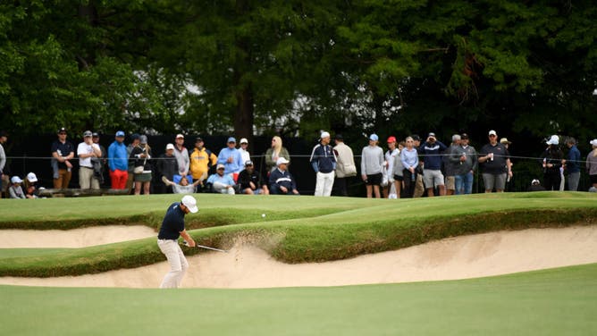 Chris Kirk hits his shot from a bunker on the 7th hole during the final round of the 2022 PGA Championship at the Southern Hills in Tulsa, Oklahoma.