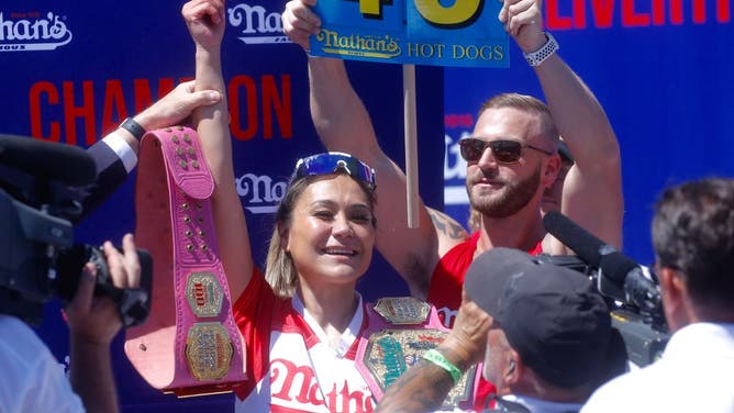 Miki Sudo reacts after eating 40 hot dogs in 10 minutes, during the 2022 Nathans Famous Fourth of July International Hot Dog Eating Contest in Coney Island, Brooklyn.