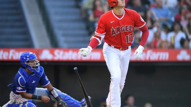 Shohei Ohtani of the Los Angeles Angels hits a three-run home run at Angel Stadium of Anaheim.