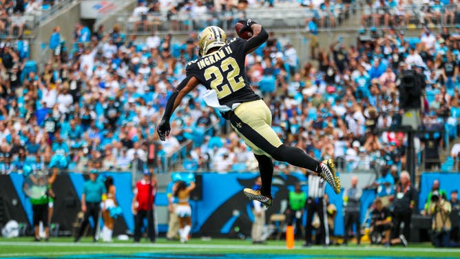 Mark Ingram II of the New Orleans Saints celebrates after scoring a touchdown against the Carolina Panthers.