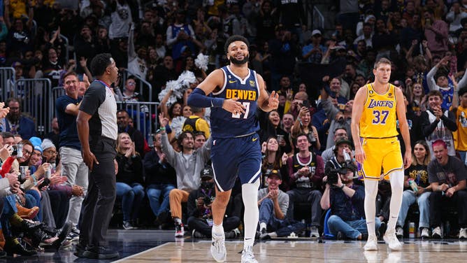 Denver Nuggets Jamal Murray prances around after hitting a big shot against the Los Angeles Lakers at the Ball Arena in Denver.