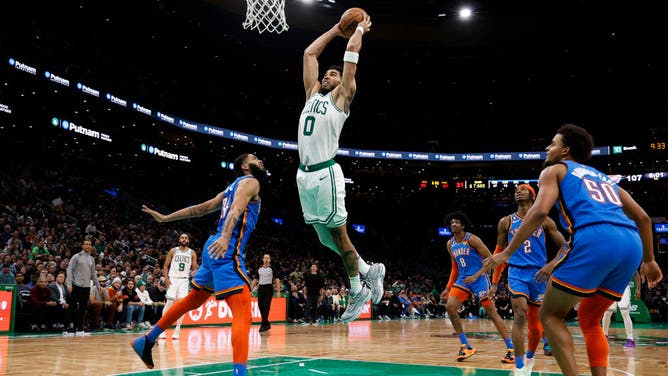 Boston Celtics SF Jayson Tatum throws it down against the Oklahoma City Thunder at TD Garden in Boston.