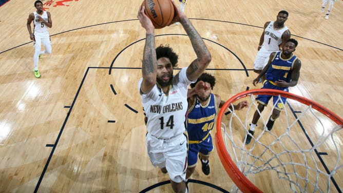 New Orleans Pelicans wing Brandon Ingram drives to the basket during the game against the Golden State Warriors at the Smoothie King Center in New Orleans, Louisiana.