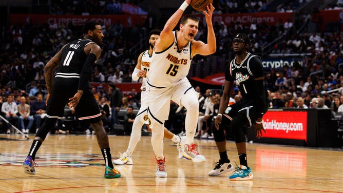 Denver Nuggets C Nikola Jokic drives to the basket against the LA Clippers at Crypto.com Arena in Los Angeles.