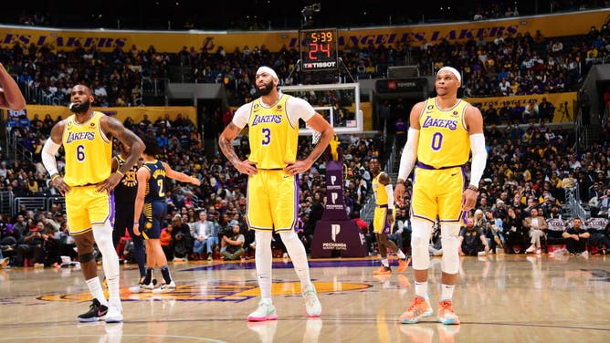 Los Angeles Lakers' LeBron James, Anthony Davis, and Russell Westbrook stand on the court during the game against the Indiana Pacers at Crypto.Com Arena in Los Angeles.