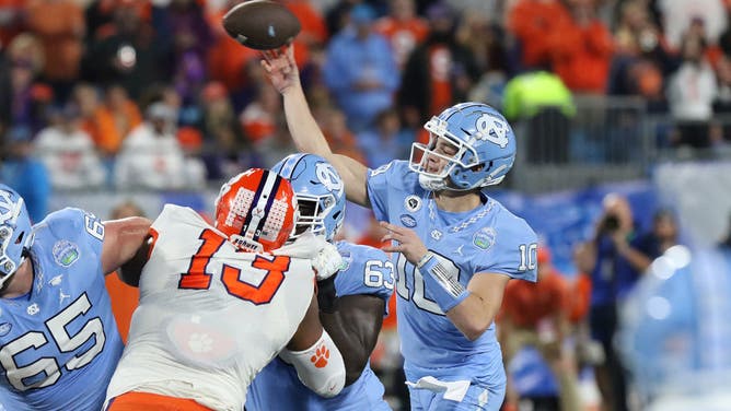 Tar Heels QB Drake Maye throws a pass during the 2022 ACC title game vs. the Clemson Tigers at Bank of America Stadium in Charlotte, North Carolina.