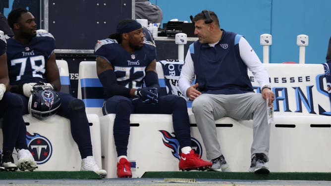 Titans RB Derrick Henry coach Mike Vrabel talk on the bench during a game against the Jaguars at Nissan Stadium in Nashville.