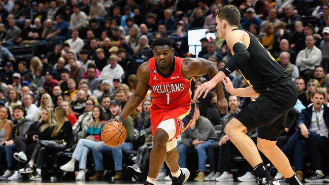 New Orleans Pelicans PF Zion Williamson drives past Jazz big Walker Kessler at Vivint Arena in Salt Lake City, Utah.