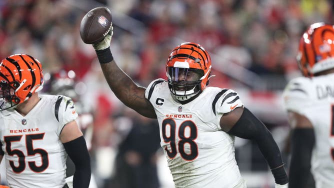 Cincinnati Bengals DT DJ Reader holds the football up after recovering a Buccaneers fumble at Raymond James Stadium in Tampa, Florida.