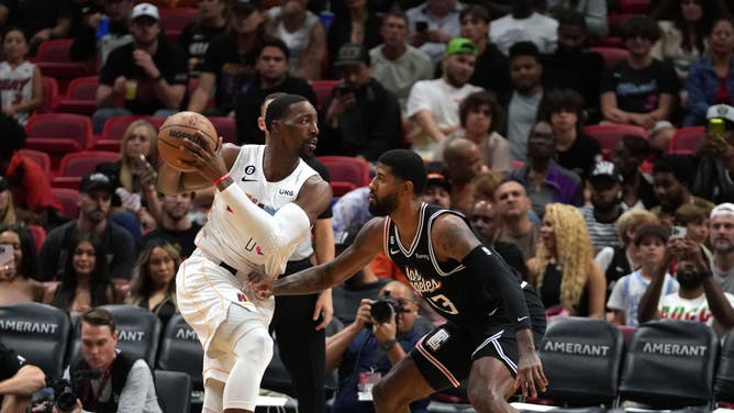 Miami Heat big Bam Adebayo operates out of the triple-threat against Los Angeles Clippers wing Paul George at FTX Arena in Miami.
