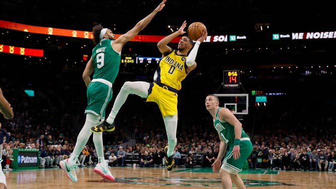 Indiana Pacers PG Tyrese Haliburton takes a floater against the Celtics at TD Garden in Boston.