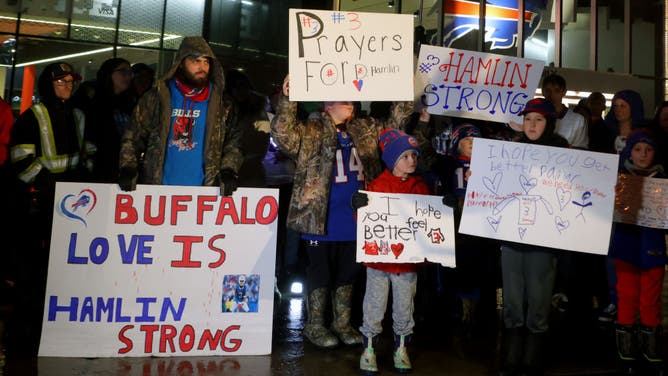 Buffalo Bills fans attend a candlelight prayer vigil for player Damar Hamlin at Highmark Stadium on January 3, 2023 in Orchard Park, New York.