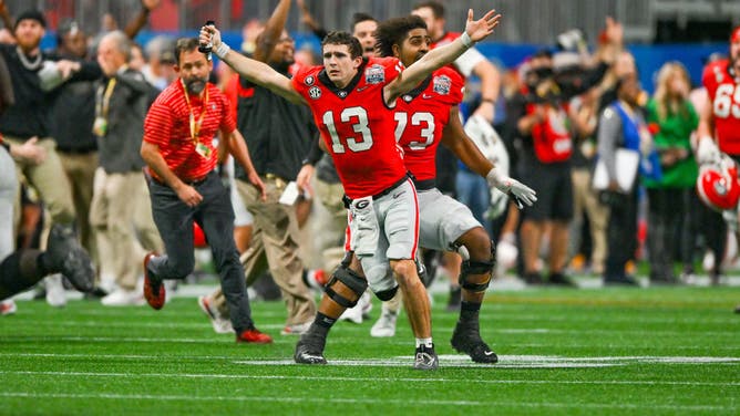 Georgia QB Stetson Bennett reacts after a missed Ohio State FG during the Chick-fil-A Peach Bowl College Football Playoff at Mercedes-Benz Stadium in Atlanta.