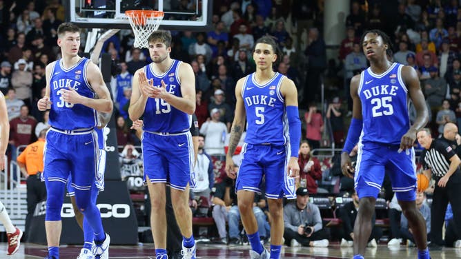 Duke Blue Devils C Kyle Filipowski, C Ryan Young, G Tyrese Proctor and F Mark Mitchell during the college hoops game between Duke Blue Devils and Boston College Eagles at Conte Forum in Chestnut Hill, MA.