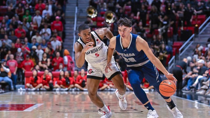 Nevada Wolf Pack guard Daniel Foster drives to the hoop vs. the San Diego State Aztecs at Viejas Arena at Aztec Bowl in San Diego.