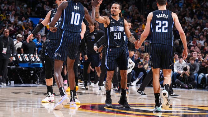 Orlando Magic celebrate during the game against the Denver Nuggets at the Ball Arena in Denver.