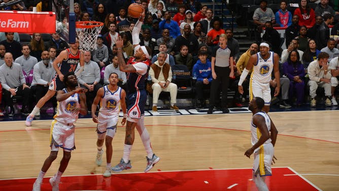 Wizards big Daniel Gafford shoots the ball vs. the Warriors at Capital One Arena in Washington, DC.