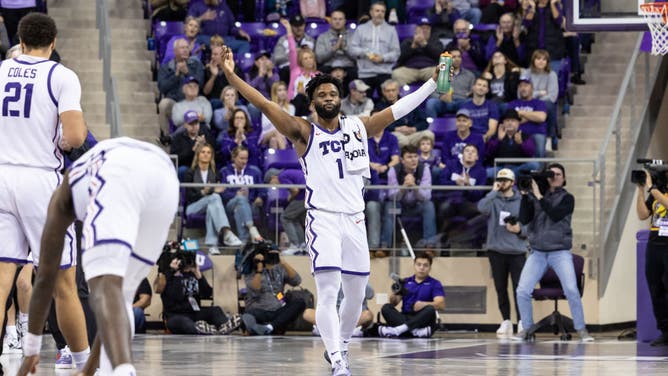 TCU Horned Frogs guard Mike Miles Jr. tries to fire up the crowd against the Kansas State Wildcats at Ed & Rae Schollmaier Arena in Fort Worth, Texas.