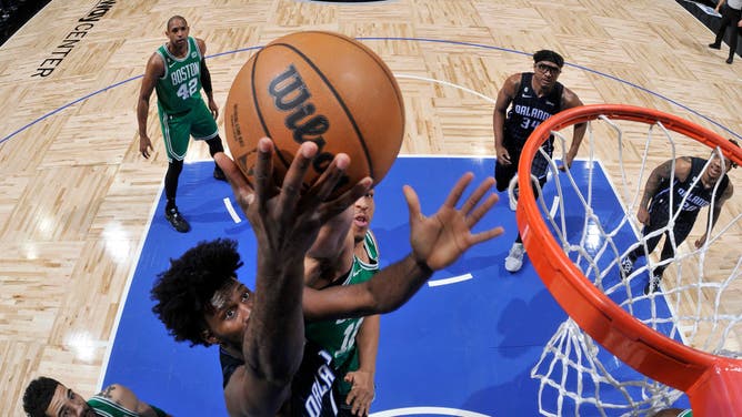 Orlando Magic wing Jonathan Isaac drives to the basket during the game against the Boston Celtics at Amway Center in Orlando, Florida.