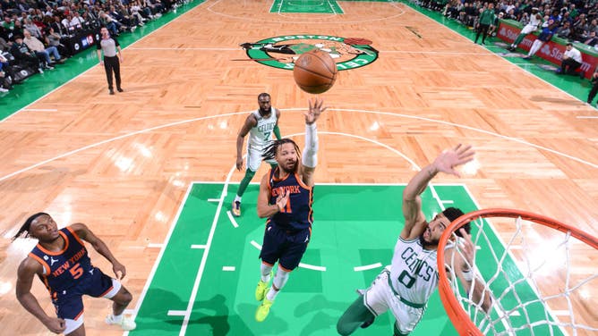 Jalen Brunson dropping a floater vs. the Celtics at the TD Garden in Boston, Massachusetts.