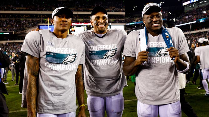 Eagles WR DeVonta Smith, QB Jalen Hurts, and WR A.J. Brown post after beating the San Francisco 49ers in the 2023 NFC Championship at Lincoln Financial Field in Philadelphia.