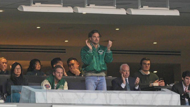Actor Bradley Cooper watches from the owners box during the NFC Championship game between the San Fransisco 49ers and the Philadelphia Eagles.