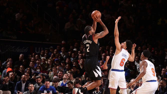 Clippers' Kawhi Leonard shoots a contested fadeaway vs. the Knicks at Madison Square Garden.