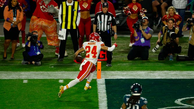 Skyy Moore of the Kansas City Chiefs scores a touchdown in the Super Bowl against the Philadelphia Eagles, one of two times the exact same play went for Chiefs TDs.
