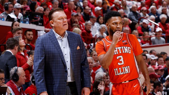 Illinois Fighting Illini head coach Brad Underwood talks with G Jayden Epps during a game vs. the Indiana Hoosiers at Assembly Hall in Bloomington, Indiana.