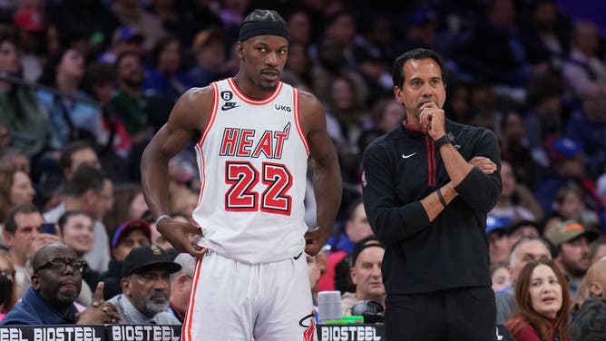 Heat wing Jimmy Butler and coach Erik Spoelstra look on vs. the 76ers at the Wells Fargo Center in Philadelphia.