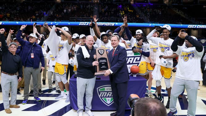 Kent State Golden Flashes accept the 2023 MAC Tournament trophy at Rocket Mortgage FieldHouse in Cleveland, Ohio.