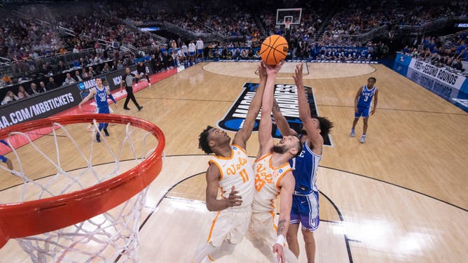 Tennessee and Duke fight for a rebound during the 2nd round of the 2023 NCAA Tournament held at Amway Center in Orlando, Florida.