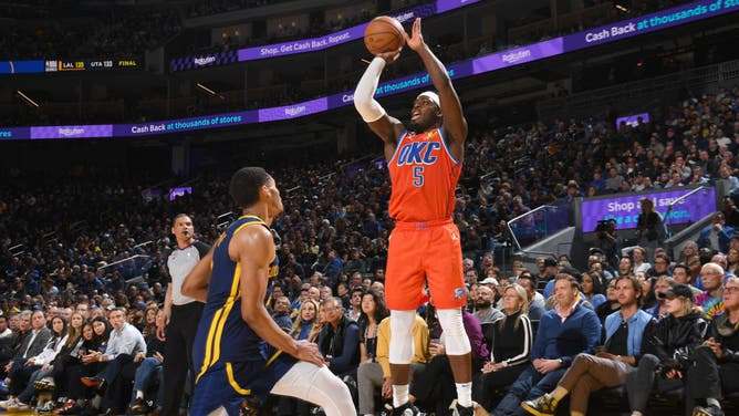Thunder G Luguentz Dort shoots a 3-pointer vs. the Golden State Warriors at Chase Center in San Francisco.