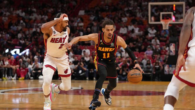 Trae Young drives to the basket against the Heat at Kaseya Center in Miami.