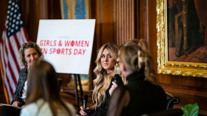 Riley Gaines speaks during a discussion on transgender athletes in women's sports during a National Girls and Women in Sports day event on Capitol Hill. Gaines competed against Lia Thomas in college swimming.