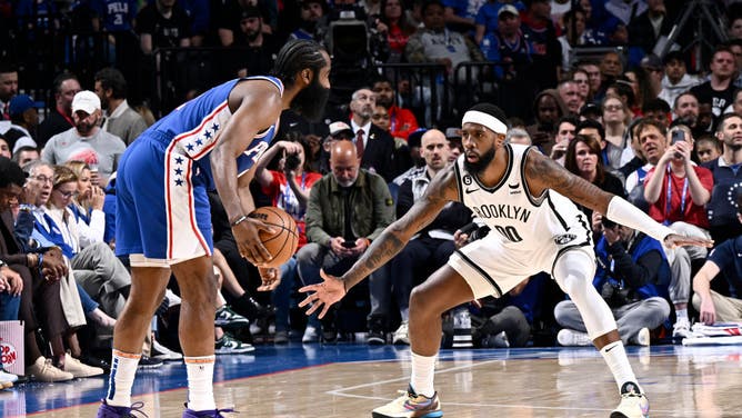 Nets F Royce O'Neale defends 76ers G James Harden in Game 2 of the 2023 NBA Playoffs at the Wells Fargo Center.