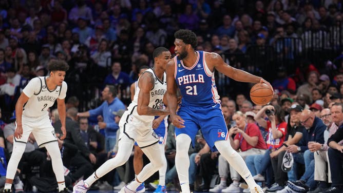 76ers big Joel Embiid posts up Nets big Nic Claxton in Game 2 of the 2023 NBA Playoffs at the Wells Fargo Center in Philadelphia.