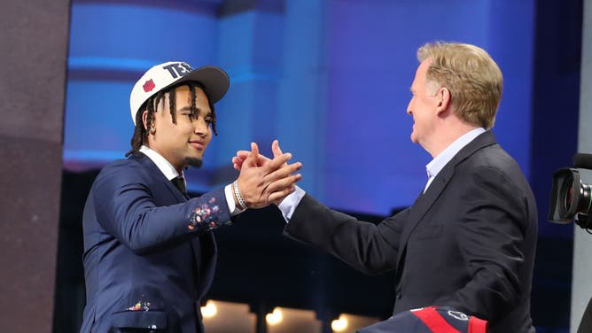 Ohio State quarterback C.J. Stroud shakes hands with commissioner Roger Goodell after being drafted by the Houston Texans in the first round of the NFL Draft.