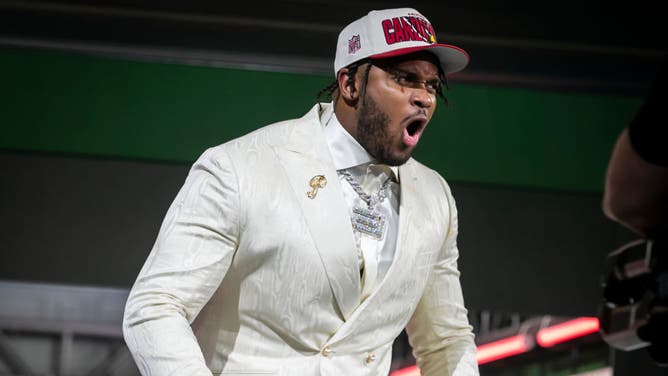 Paris Johnson Jr. reacts with excitement after being drafted by the Arizona Cardinals during Round One of the 2023 NFL Draft.
