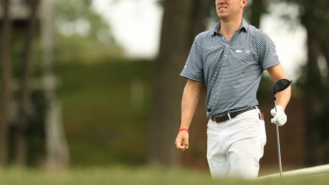 Justin Thomas reacts to his shot from the 18th tee during the 1st round of the 2020 Travelers Championship at TPC River Highlands.