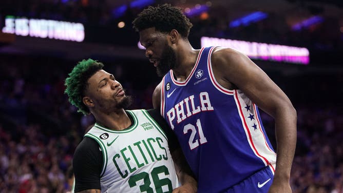 Philadelphia 76ers C Joel Embiid and Boston Celtics PG Marcus Smart have a stare-down following a Smart foul in the 1st quarter of Game 4 of the 2023 Eastern Conference Semifinals.
