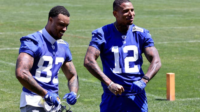 Tight ends Lawrence Cager and Darren Waller pose as they walk off the field after OTA's. Waller seems to be really enjoying his time with the New York Giants.