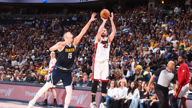 Miami Heat PF Kevin Love shoots a 3 during Game 2 of the 2023 NBA Finals vs. the Nuggets at the Ball Arena in Denver, Colorado.