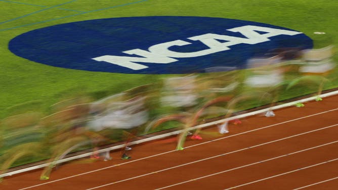 The NCAA Logo is shown as athletes competes in the men's 10000 meter run during the Division I Men's and Women's Outdoor Track & Field Championship.