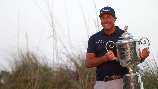 Phil Mickelson celebrates with the Wanamaker Trophy after winning during the final round of the 2021 PGA Championship held at the Ocean Course of Kiawah Island Golf Resort on May 23, 2021 in Kiawah Island, South Carolina.