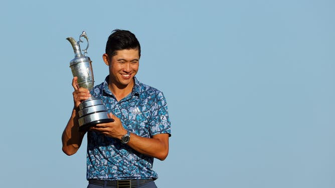 Collin Morikawa with the Claret Jug after winning The 149th Open at Royal St George’s Golf Club in Sandwich, England.