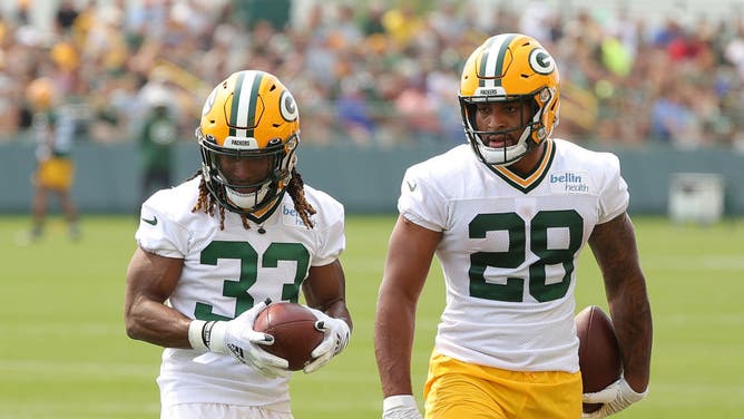 Green Bay RBs Aaron Jones and AJ Dillon during offseason training camp at Ray Nitschke Field in Wisconsin.