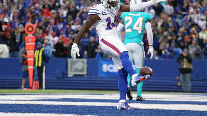 Buffalo Bills WR Stefon Diggs punts the ball into the stands after a TD catch against the Miami Dolphins at Highmark Stadium in Orchard Park, New York.